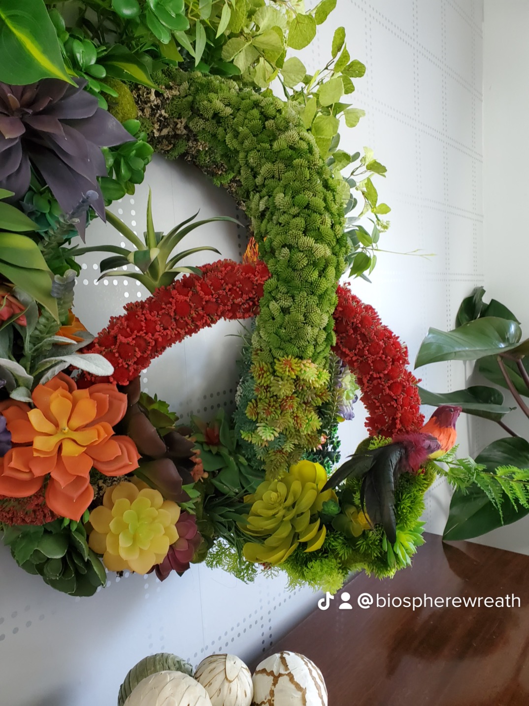 Bird of Paradise Biosphere Dome Wreath® close-up from side angle