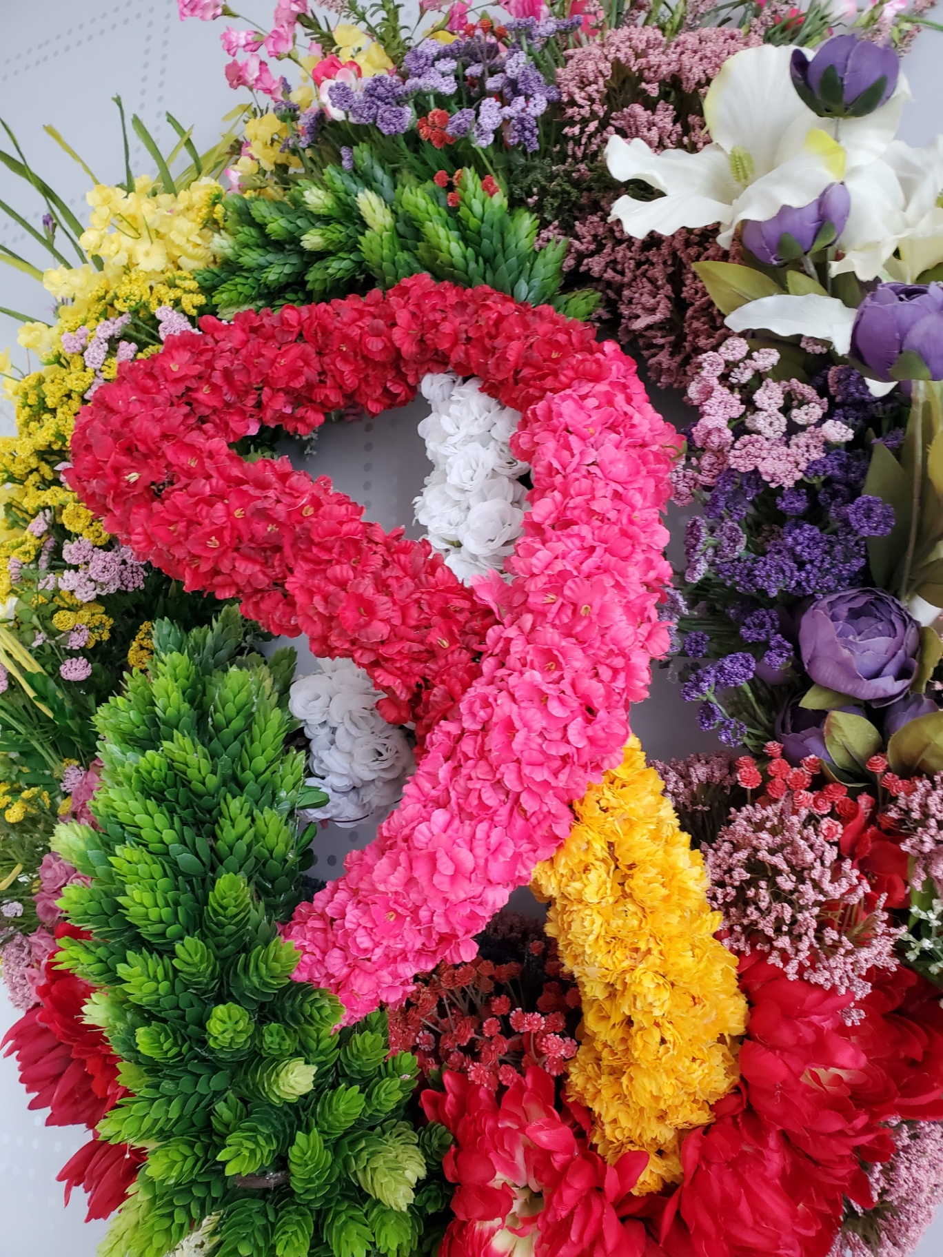 Floral Collection — full view of wreath with pink, red, white, and yellow flowers.